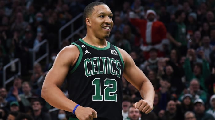 Celtics forward Grant Williams reacts after a basket during the first half against the Minnesota Timberwolves.